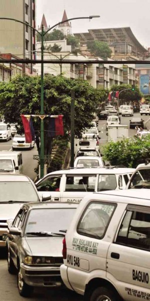 RUSH hour traffic on Session Road      Photo by RICHARD BALONGLONG/FILE PHOTO