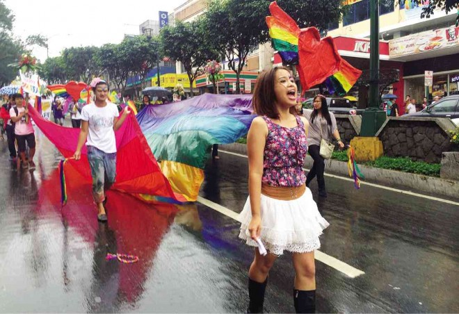 RAINED OUT PARADE A mild rain fell over Baguio City on Sunday, but that did not stop over 50 gay rights advocates who mounted the 8th Baguio Pride Parade along downtown Baguio. The group is lobbying for an antidiscrimination law and has expressed objections to a plan to make AIDS testing mandatory for HIV-vulnerable sectors like the gay community. VINCENT CABREZA/INQUIRER NORTHERN LUZON