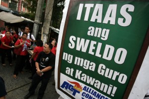 Teachers and education advocates gather at Mendiola Bridge in Manila on June 2 to address the shortages in public education and enact salary increase. INQUIRER FILE PHOTO