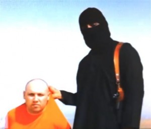 Journalist Steven Sotloff and his executioner. AP File Photo 