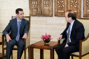 A handout picture released by the Syrian Arab News Agency (SANA) shows Syria's President Bashar al-Assad (L) meeting with British MP for the Conservatives party Brooks Newmark in Damascus on June 27, 2011. AFP/SANA 