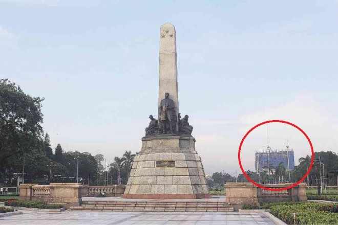 TAKING its own photos of Rizal Monument and Torre de Manila (encircled), DMCI says “one may stand near the monument and choose certain angles to avoid or, at the very least, minimize the building’s intrusion.”  PHOTO FROM DMCI