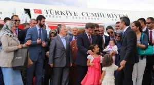 rkish Prime Minister Ahmet Davutoglu, center right, stands with freed hostages at the airport in Ankara, Turkey, Saturday, Sept. 20, 2014. Dozens of Turkish hostages seized by Islamic militants in Iraq three months ago were freed and safely returned to Turkey on Saturday ending Turkey’s most serious hostage crisis. The 49 hostages were captured from the Turkish Consulate in Mosul, Iraq on June 11, when the Islamic State group overran the city in its surge to seize large swaths of Iraq and Syria. AP
