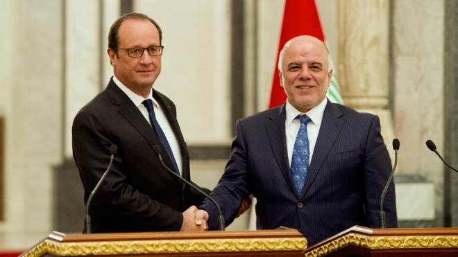 Iraq's new Prime Minister Haidar al-Abadi, right, and French President Francois Hollande.  (AP Photo/Alain Jocard, Pool)