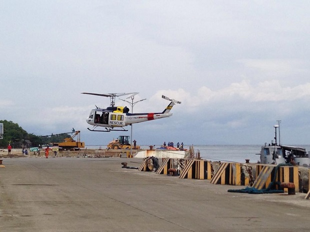 SEPTEMBER 14, 2014 A Philippine Air Force helicopter lands at Lipata Port after surveyingthe area off Surigao-Leyte channel where MV Maharlika 2 capsized. CONTRIBUTED PHOTO BY JUN CLERIGO --