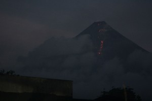 SEPTEMBER 16, 2014 A photo of Mayon Volcano captured at around 3 a.m. on Tuesday, shows lava cascading from its crater, as viewed from Barangay Rawis, Legazpi City. The Philippine Institute of Volcanology and Seismology has raised alert level three over the volcano, after observing a “noticeable escalation of unrest recorded by the Mayon Volcano monitoring network.”  INQUIRER PHOTO/MARK ALVIC ESPLANA/INQUIRER SOUTHERN LUZON
