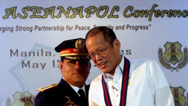 President Benigno S. Aquino III and resigned Philippine National Police (PNP) Director General Alan Purisima.  Malacañang Photo Bureau 