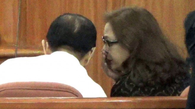 Senator Juan Ponce Enrile and Atty. Gigi Reyes during their hearing at the Sandiganbayan on Friday, Sept. 5, 2014. Ryan Leagogo/INQUIRER.net