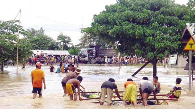 FLOODING in Mamasapano town, Maguindanao province  PHOTO FROM ARMM BUREAU OF PUBLIC INFORMATION