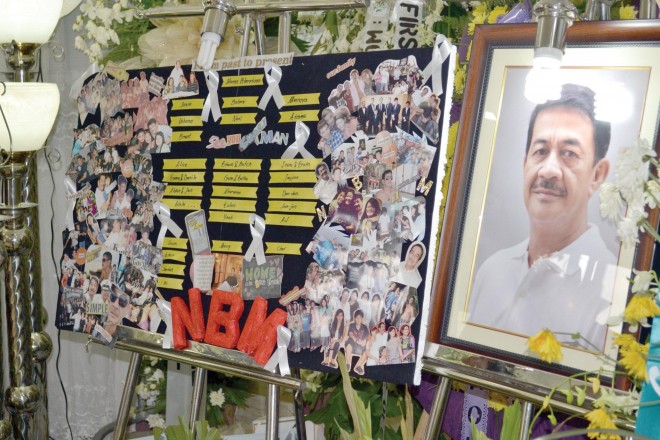 Friends and family pay their last respects to Nelson Morales, former city engineer of Makati and Albay chair of the United Nationalist Alliance, in his residence in Malinao town, at his wake. Morales was buried Sept. 15, 2012. MAR S. ARGUELLES/INQUIRER SOUTHERN LUZON FILE PHOTO