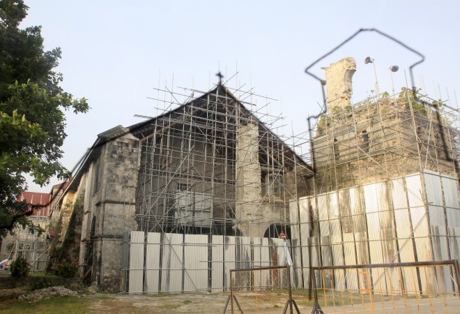 Baclayon church under renovation after being heavily damaged by the October 15 earthquake that struck the province a year ago. INQUIRER/ MARIANNE BERMUDEZ