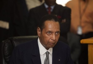 In this Feb. 28, 2013 file photo, former Haitian dictator Jean-Claude Duvalier, known as "Baby Doc," attends his hearing at court in Port-au-Prince, Haiti.   AP