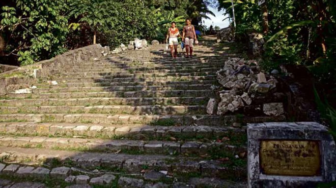 DAMAGED HERITAGE The stairs of a national heritage site in Loon, Bohol province, have yet to be repaired one year after it was damaged by 7.2-magnitude earthquake. PHOTOS BY LITOTECSON/CEBU DAILY NEWS