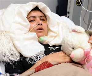 This undated file photo provided by the University Hospital Birmingham NHS Foundation Trust on Friday, Oct. 19, 2012, 15-year old Pakistani shooting victim Malala Yousafzai recovers in Queen Elizabeth Hospital in Birmingham, England, after being shot in the head by the Taliban in Pakistan for advocating education for girls. AP