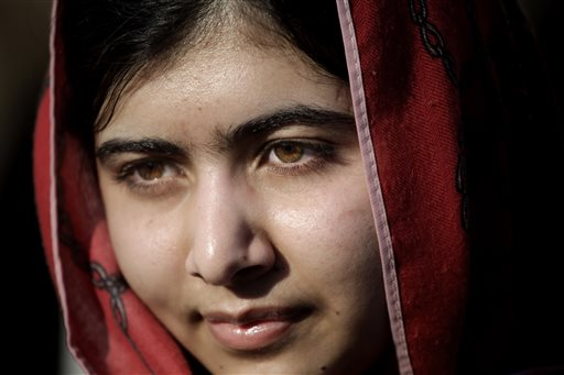  In this Feb. 18, 2014 file photo, Malala Yousafzai, visits Zaatari refugee camp near the Syrian border in Mafraq, Jordan. Children's rights activists Yousafzai, 17, of Pakistan and Kailash Satyarthi of India were awarded the Nobel Peace Prize Friday, Oct. 10, 2014. AP 