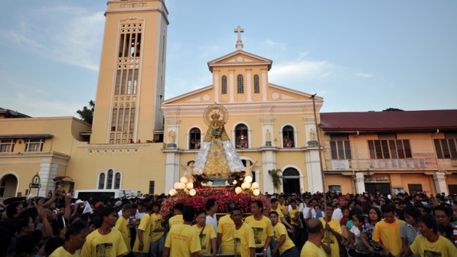FROM SHRINE TO BASILICAMINORE A procession during the Manaoag town fiesta in 2012 leaves the Shrine ofOur Lady of the Rosary of Manaoag in Pangasinan province. WILLIE LOMIBAO/INQUIRER NORTHERN LUZON