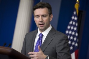 White House press secretary Josh Earnest gestures as he answers a question during the daily press briefing at the White House in Washington, Wednesday, Oct. 8, 2014.  AP
