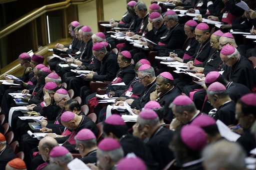 Bishops attend a morning session of a two-week synod on family issues at the Vatican, Monday, Oct. 13, 2014.  AP 