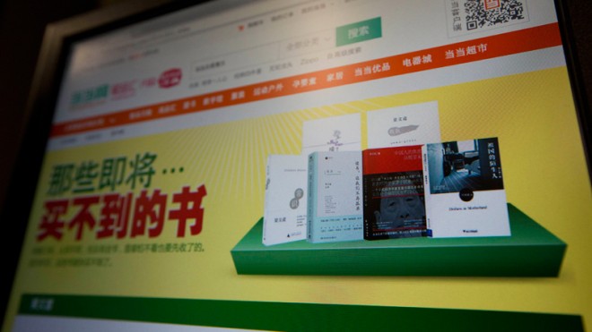 In this photo taken Monday, Oct. 13, 2014, an online shopping website with the headline "Those books that soon can't be bought" and images of books by authors such as Yu Ying-shih is displayed on a computer screen in Beijing. Authorities in China have ordered books by Chinese-American scholar Yu Ying-shih and several others to be removed from sale, as Beijing expresses its displeasure with writers showing support for pro-democracy movements in Hong Kong and elsewhere, bookstores and publishers said. (AP Photo/Ng Han Guan)