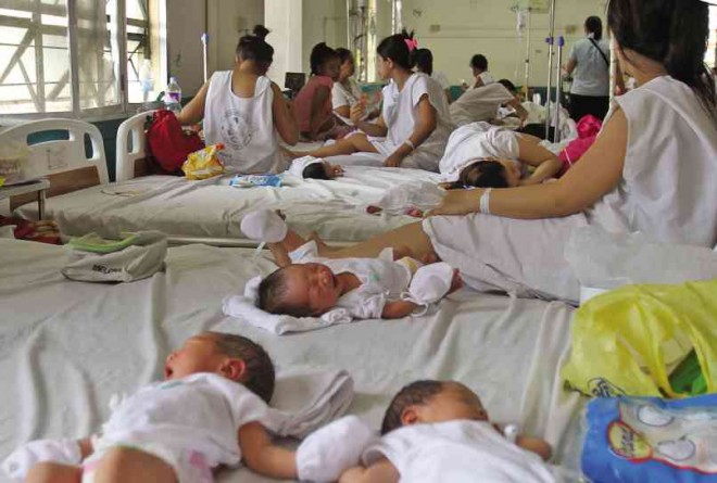 A MANILA hospital is overwhelmed by the number of women giving birth in a scene repeated many times over outside the metropolis, including the Ilocos region where one of every 10 mothers is a teenager. JOAN BONDOC
