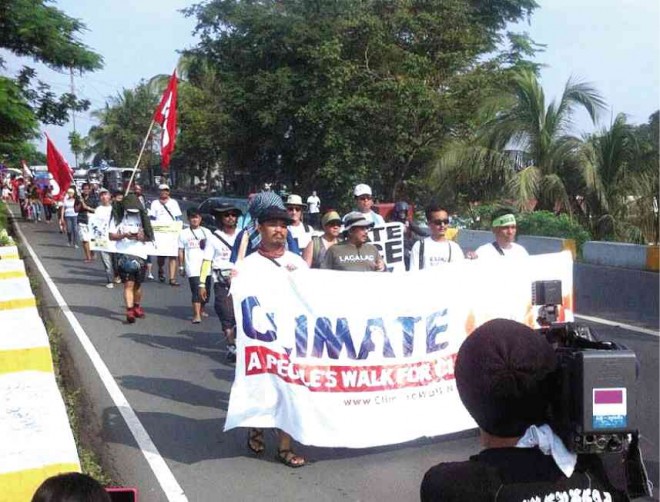 CLIMATE advocates embark on a 1,000-kilometer walk to raise public awareness on the effects of climate change and global warming. The group hopes to arrive in Tacloban City, Leyte province, the Ground Zero of Supertyphoon “Yolanda,” on Nov. 8. CONTRIBUTED PHOTO