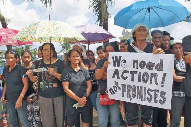 RESIDENTS of Estancia, Iloilo hold a rally to protest the delay in government help. NESTOR P. BURGOS JR/INQUIRER VISAYAS