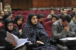 In this picture taken on Dec. 15, 2008, Iranian Reyhaneh Jabbari, center, sits while attending her trial in a court in Tehran, Iran. Jabbari was hanged on Saturday, Oct. 25, 2014, who was convicted of murdering a man she said was trying to rape her, the official IRNA news agency reported. AP