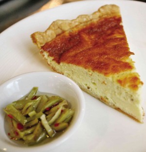 Four-cheese tart, which is served  with a side of guava compote.