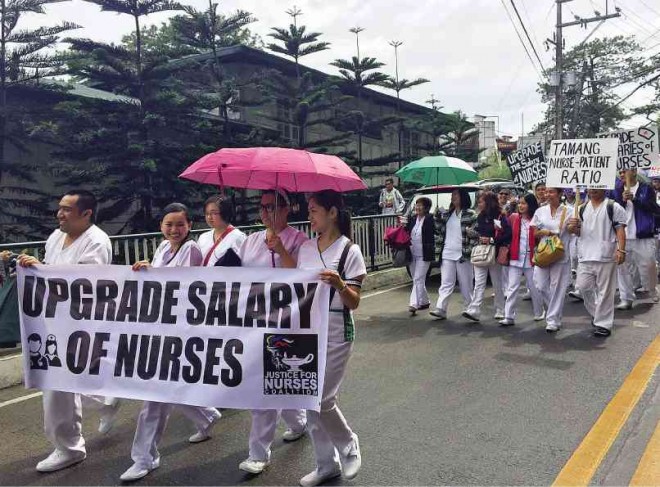 BAGUIO City’s nursing community marches on Oct. 29 to demand better pay. The nurses also announced their readiness to become a national union. VINCENT CABREZA/INQUIRER NORTHERN LUZON