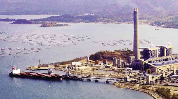 A SHIP delivers coal to the Sual power plant. Photo was taken in 2011.  WILLIE LOMIBAO/CONTRIBUTOR