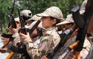 In this Thursday, July 3, 2014 photo, an elite unit of women Kurdish Peshmerga fighters trains in Sulaimaniyah, 160 miles (260 kilometers) northeast of Baghdad, Iraq. AP