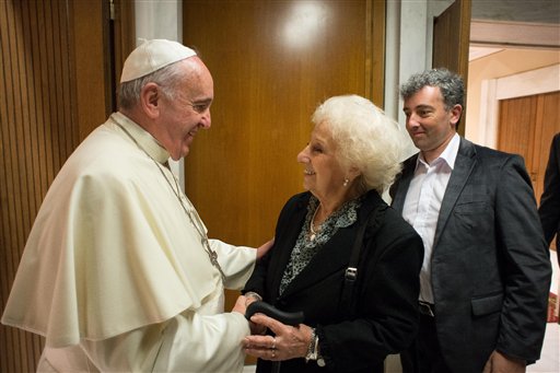  In this photo provided by the Vatican newspaper L'Osservatore Romano, Pope Francis meets Argentine human rights activist and leader of the Grandmothers of the Plaza de Mayo Estela Barnes de Carlotto, and her grandson Ignacio Guido Montoya Carlotto during a private audience at the Vatican Wednesday, Nov. 5, 2014.