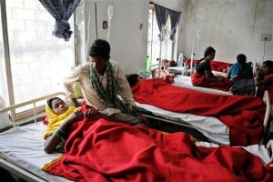 Indian women who underwent sterilization surgeries receive treatment at the District Hospital in Bilaspur, in the central Indian state of Chhattisgarh, Wednesday, Nov. 12, 2014, after at least a dozen died and many others fell ill following similar surgery. AP