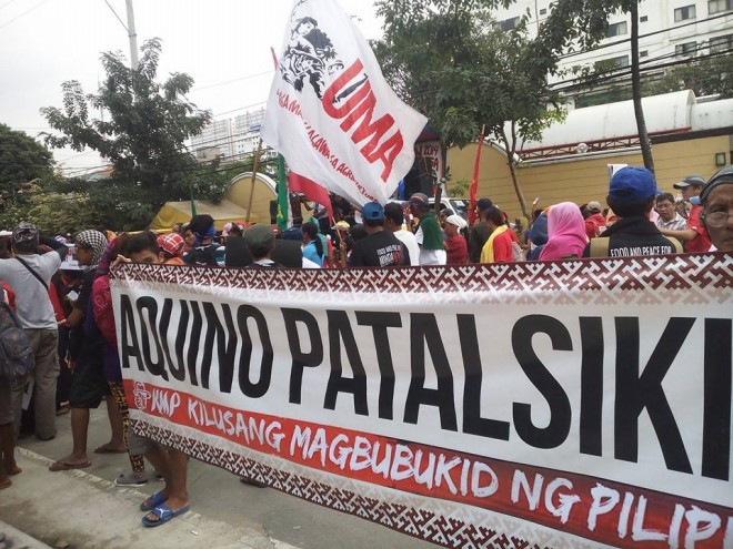 Farmers and indigenous peoples protest outside President Benigno Aquino III's house in Times St., Quezon City. Photo contributed by Unyon ng mga Manggagawa sa Agrikultura (UMA).