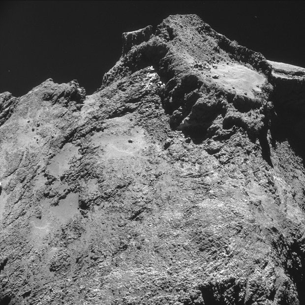 The picture taken with the navigation camera on Rosetta and released by the European Space Agency ESA shows a raised plateau on the larger lobe of Comet 67P/ChuryumovGerasimenko. It was captured from a distance of 9.8 km from the center of the comet (7.8 km / 4.8 miles from the surface) Oct. 24,  2014. On Wednesday, Nov. 12,  2014 the Philae lander will be detached from Rosetta to land on the comet. (AP Photo/ESA)