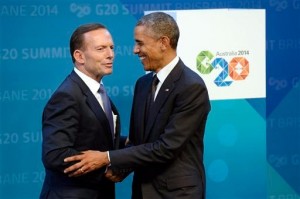 United States President Barack Obama, right, shakes hands with Australian Prime Minister Tony Abbott as he arrives at the G-20 Summit in Brisbane, Australia Saturday, Nov.15, 2014. AP