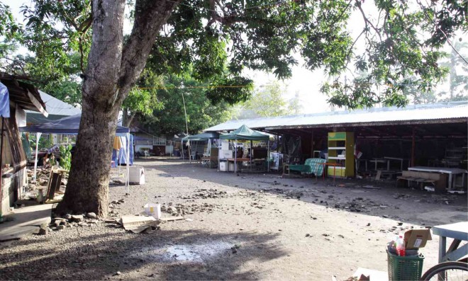 THE COMPOUND of SMLC-Gabai in a Lucena City village, which used to teem with vendors selling merchandise to investors in exchange for “points,” is now empty. DELFIN T. MALLARI JR./INQUIRER SOUTHERN LUZON
