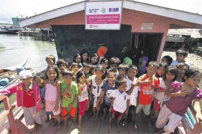 A PINK floating school moored at a community of houses on stilts in Bongao town, Tawi-Tawi province, stands as a beacon of hope for Badjao children, who have little access to education in the country. 
