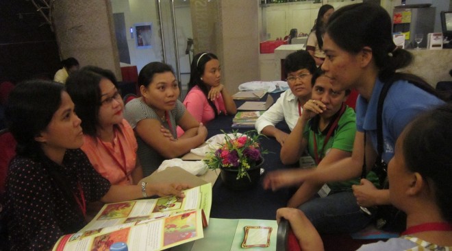 Iloilo and Guimaras teachers discussing new storytelling techniques during the workshop sponsored by Uygongco Foundation, Inc. (UFI).