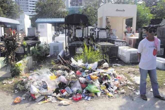 An open trash heap left on All Saints’ Day by Manila South Cemetery visitors who paid no mind to the EcoWaste Coalition’s environmental campaign. ARNOLD ALMACEN