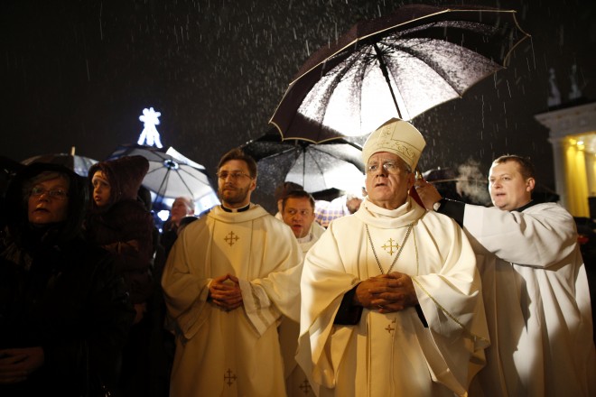 Priests and clergy attend the Christmas celebration midnight Mass at the Cathedral-Basilical in Vilnius, Lithuania, Wednesday, Dec. 24, 2014. Over 80 percent of Lithuanians are Christians who celebrate the festival of Christmas on Dec. 25. AP