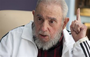 In this July 11, 2014 file photo, Cuba's Fidel Castro speaks with Russia's President Vladimir Putin in Havana, Cuba. Amid the excitement over the thaw in U.S.-Cuba relations, one person has been conspicuously absent: Fidel Castro. AP