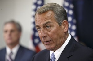 House Speaker John Boehner of Ohio, joined by Majority Leader Kevin McCarthy of Calif., left, meets with reporters on Capitol Hill in Washington, Tuesday, Dec. 2, 2014, following a House Republican caucus meeting. AP