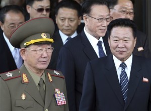 In this Saturday, Oct. 4, 2014 file photo, North Korea’s National Defense Commission Vice Chairman Hwang Pyong So, left, and North Korea’s ruling Workers Party Secretaries, Choe Ryong Hae, right, and Kim Yang Gon, center right, leave after a meeting with South Korean officials at a hotel in Incheon, South Korea. AP