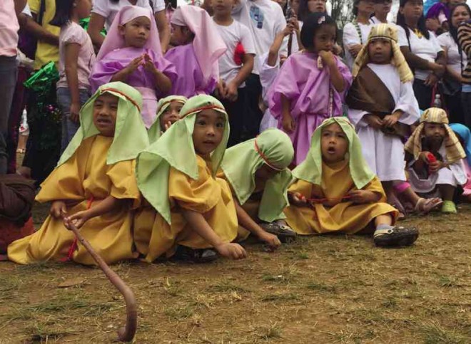 NATIVITY CHARACTERS Schoolchildren dressed as shepherds from the biblical Nativity story take part in the 41st staging of “Silahis ng Pasko” at Burnham Park in Baguio City. The event opened this year’s Christmas program in the summer capital. VINCENT CABREZA/INQUIRER NORTHERN LUZON
