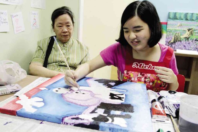 NINA Bantoto, who was diagnosed with autism at a young age, is one of the artists whose artworks are featured in the calendar. KIMBERLY DELA CRUZ