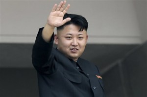 In this July 27, 2013 file photo, North Korea's leader Kim Jong Un waves to spectators and participants of a mass military parade celebrating the 60th anniversary of the Korean War armistice in Pyongyang, North Korea. AP