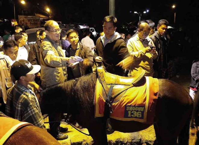 TRESPASSER? President Aquino, during a visit in November to one of Baguio’s most famous tourist destinations, Wright Park, may not have known that he is technically a trespasser as the land had been classified as ancestral land titled to an Ibaloy family. EV ESPIRITU / INQUIRER NORTHERN LUZON 