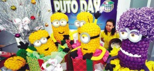 THE MARKET is ready for “puto,” shaped to form the cinematic characters, “Minions.”  PHOTOS BY WILLIE LOMIBAO/CONTRIBUTOR  