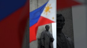 A Philippine flag waves in front of the Rizal Monument at Luneta Park in Manila on June 19, 2011 during a ceremony to mark the 150th birth anniversary of Philippine national hero Jose Rizal. Rizal, who was born on June 19, 1861, was executed by Spain in 1896 by a firing squad after he was accused of leading a revolution during the Spanish colonial period of Philippine history.     AFP PHOTO / NOEL CELIS